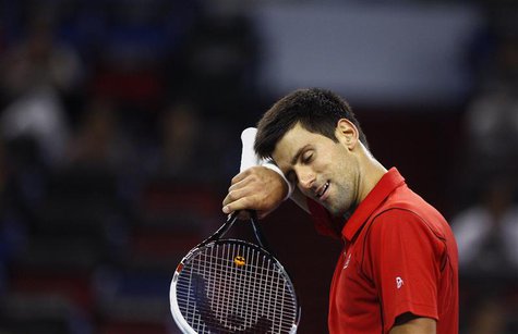 Novak Djokovic of Serbia reacts after winning a point during his men's singles tennis match against Marcel Granollers of Spain at the Shangh Novak Djokovic of Serbia reacts after winning a point during his men's singles tennis match against Marcel Granollers of Spain at the Shangh