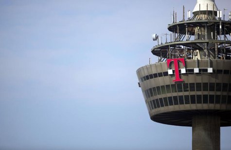 The logo of Deutsche Telekom is pictured on the 266 metre high "Colonia" TV tower in the western German city of Cologne March 25, 2013. REUT The logo of Deutsche Telekom is pictured on the 266 metre high "Colonia" TV tower in the western German city of Cologne March 25, 2013. REUT