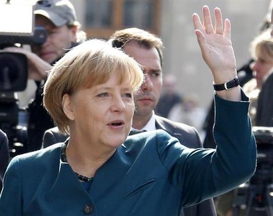 German Chancellor and leader of the Christian Democratic Union (CDU) Angela Merkel arrives with senior party leaders at the Parliamentary So German Chancellor and leader of the Christian Democratic Union (CDU) Angela Merkel arrives with senior party leaders at the Parliamentary So