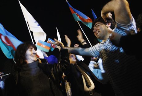 Supporters of Azerbaija's President Ilham Aliyev celebrate his victory on the presidential elections in Baku, October 9, 2013. REUTERS/David Supporters of Azerbaija's President Ilham Aliyev celebrate his victory on the presidential elections in Baku, October 9, 2013. REUTERS/David