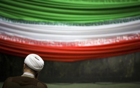 A lawmaker sits at the Iranian Parliament as he attends a ceremony to mark Parliament day in Tehran December 1, 2009. REUTERS/Morteza Nikoub A lawmaker sits at the Iranian Parliament as he attends a ceremony to mark Parliament day in Tehran December 1, 2009. REUTERS/Morteza Nikoub