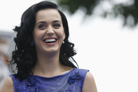 Singer Katy Perry, who voices the character of "Smurfette", smiles at the premiere of "The Smurfs 2" at the Regency Village theatre in Los A Singer Katy Perry, who voices the character of "Smurfette", smiles at the premiere of "The Smurfs 2" at the Regency Village theatre in Los A