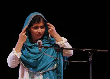 Pakistan's Malala Yousafzai adjusts her headscarf as she gives a speech after receiving the RAW (Reach All Women) in War Anna Politkovskaya Pakistan's Malala Yousafzai adjusts her headscarf as she gives a speech after receiving the RAW (Reach All Women) in War Anna Politkovskaya