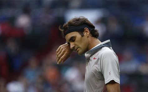 Roger Federer of Switzerland reacts after losing a point during his men's singles tennis match against Gael Monfils of France at the Shangha Roger Federer of Switzerland reacts after losing a point during his men's singles tennis match against Gael Monfils of France at the Shangha