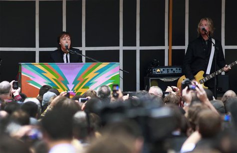 Singer Paul McCartney gestures as he plays a surprise mini-concert in New York's Times Square, October 10, 2013. REUTERS/Shannon Stapleton Singer Paul McCartney gestures as he plays a surprise mini-concert in New York's Times Square, October 10, 2013. REUTERS/Shannon Stapleton