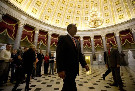 U.S. House Speaker John Boehner (R-OH) (C) walks to a house vote on border safety and security on Capitol Hill in Washington, October 10, 20 U.S. House Speaker John Boehner (R-OH) (C) walks to a house vote on border safety and security on Capitol Hill in Washington, October 10, 20