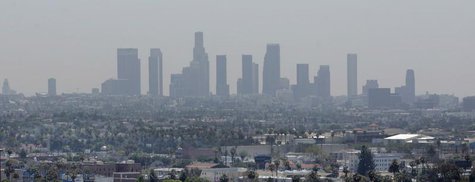 The skyline of downtown Los Angeles through a layer of smog is seen in the distance from a rooftop in Hollywood, California, May 31, 2006. R The skyline of downtown Los Angeles through a layer of smog is seen in the distance from a rooftop in Hollywood, California, May 31, 2006. R