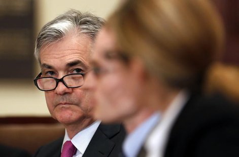 Federal Reserve Board of Governors member Jerome Powell listens during an open board meeting at the Federal Reserve in Washington in this De Federal Reserve Board of Governors member Jerome Powell listens during an open board meeting at the Federal Reserve in Washington in this De