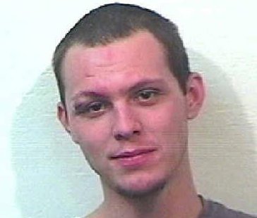 Kane Reeves. The self-inflicted injuries that deputies say occurred when he banged his head against the plastic shield that separates the back from the front seat in the patrol car is evident in this mugshot. Kane Reeves. The self-inflicted injuries that deputies say occurred when he banged his head against the plastic shield that separates the back from the front seat in the patrol car is evident in this mugshot.