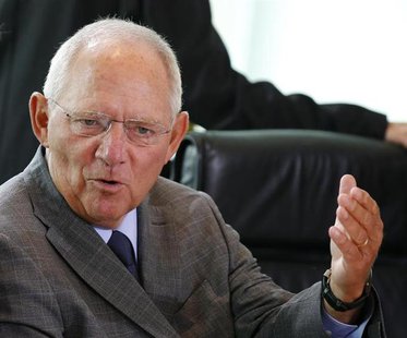German Finance Minister Wolfgang Schaeuble gestures during a cabinet meeting at the Chancellery in Berlin August 28, 2013. REUTERS/Fabrizio German Finance Minister Wolfgang Schaeuble gestures during a cabinet meeting at the Chancellery in Berlin August 28, 2013. REUTERS/Fabrizio