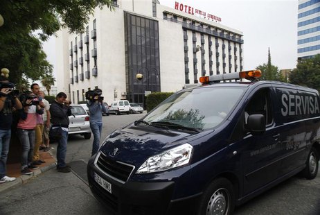 The body of Maria de Villota, former Marussia Formula One test driver, is taken away after she was found dead in a hotel in Seville October The body of Maria de Villota, former Marussia Formula One test driver, is taken away after she was found dead in a hotel in Seville October