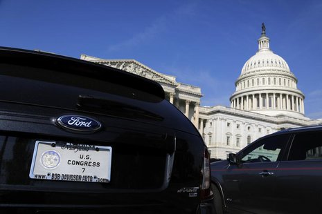 The cars of members of Congress, including one (L) belonging to a member of the Maryland delegation, fill the parking lot outside the House The cars of members of Congress, including one (L) belonging to a member of the Maryland delegation, fill the parking lot outside the House