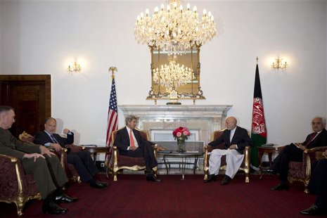 U.S. Secretary of State John Kerry (3rd L) meets with Afghan President Hamid Karzai, in Kabul October 11, 2013. REUTERS/Jacquelyn Martin/Poo U.S. Secretary of State John Kerry (3rd L) meets with Afghan President Hamid Karzai, in Kabul October 11, 2013. REUTERS/Jacquelyn Martin/Poo