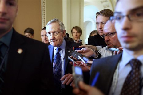 U.S. Senate Majority Leader Harry Reid (D-NV) is trailed by reporters on his way to a Democratic caucus meeting at the U.S. Capitol in Washi U.S. Senate Majority Leader Harry Reid (D-NV) is trailed by reporters on his way to a Democratic caucus meeting at the U.S. Capitol in Washi