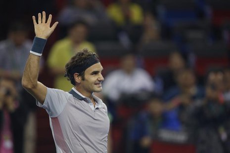 Roger Federer of Switzerland reacts after winning his men's singles tennis match against Andreas Seppi of Italy at the Shanghai Masters tenn Roger Federer of Switzerland reacts after winning his men's singles tennis match against Andreas Seppi of Italy at the Shanghai Masters tenn