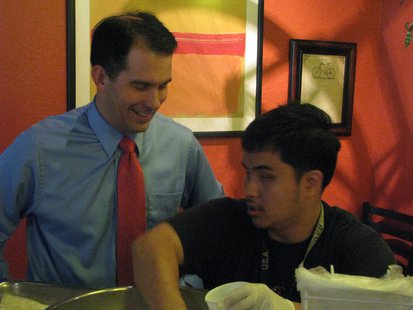 Gov. Scott Walker with Thao Pao Xiong at Red Eye Brewing Company in Wausau promoting a disability employment awareness campaign with the state and the Wisconsin Board for People With Developmental Disabilities called Take Your Legislator to Work. 10/11/13 WSAU
Gov. Scott Walker with Thao Pao Xiong at Red Eye Brewing Company in Wausau promoting a disability employment awareness campaign with the state and the Wisconsin Board for People With Developmental Disabilities called Take Your Legislator to Work. 10/11/13 WSAU