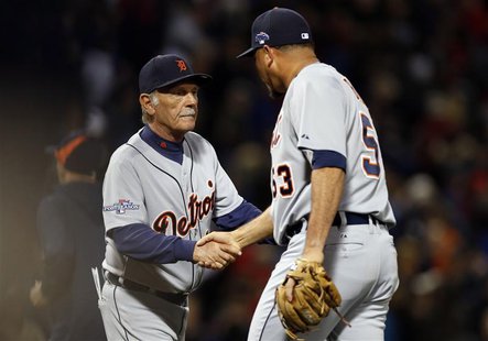 Oct 12, 2013; Boston, MA, USA; Detroit Tigers manager Jim Leyland congratulates pitcher Joaquin Benoit (53) after defeating the Boston Red S Oct 12, 2013; Boston, MA, USA; Detroit Tigers manager Jim Leyland congratulates pitcher Joaquin Benoit (53) after defeating the Boston Red S