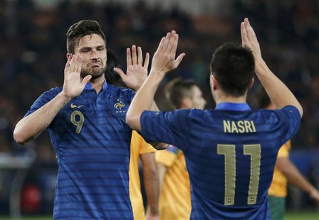 France's Olivier Giroud (L) celebrates with team mate France's Samir Nasri after he scored against Australia during their friendly soccer ma France's Olivier Giroud (L) celebrates with team mate France's Samir Nasri after he scored against Australia during their friendly soccer ma