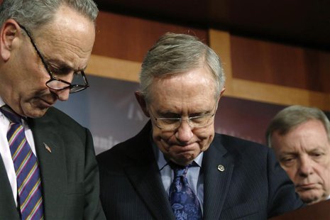 (L-R) U.S. Senator Charles Schumer (D-NY), Senate Majority Leader Harry Reid (D-NV), and Senator Richard Durbin (D-IL) attend a news confere (L-R) U.S. Senator Charles Schumer (D-NY), Senate Majority Leader Harry Reid (D-NV), and Senator Richard Durbin (D-IL) attend a news confere