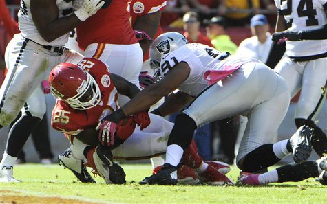 Oct 13, 2013; Kansas City, MO, USA; Kansas City Chiefs running back Jamaal Charles (25) scores a touchdown against Oakland Raiders defensive Oct 13, 2013; Kansas City, MO, USA; Kansas City Chiefs running back Jamaal Charles (25) scores a touchdown against Oakland Raiders defensive