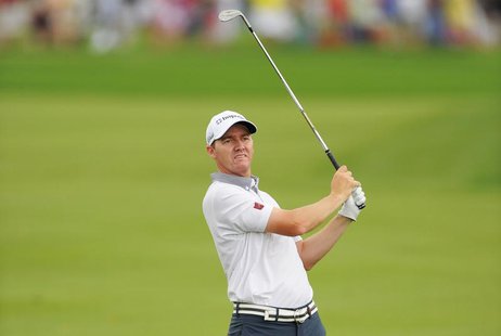 Jimmy Walker of the U.S. watches his shot on the first hole during final round play in the Arnold Palmer Invitational PGA golf tournament in Jimmy Walker of the U.S. watches his shot on the first hole during final round play in the Arnold Palmer Invitational PGA golf tournament in