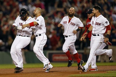Oct 12, 2013; Boston, MA, USA; Boston Red Sox right fielder Shane Victorino (second from left) congratulates catcher Jarrod Saltalamacchia ( Oct 12, 2013; Boston, MA, USA; Boston Red Sox right fielder Shane Victorino (second from left) congratulates catcher Jarrod Saltalamacchia (
