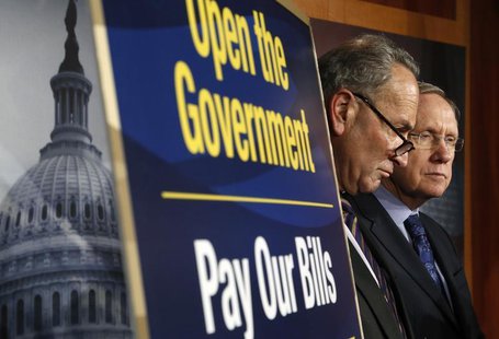 U.S. Senator Charles Schumer (D-NY) (L) and Senate Majority Leader Harry Reid (D-NV) address reporters at a news conference at the U.S. Capi U.S. Senator Charles Schumer (D-NY) (L) and Senate Majority Leader Harry Reid (D-NV) address reporters at a news conference at the U.S. Capi