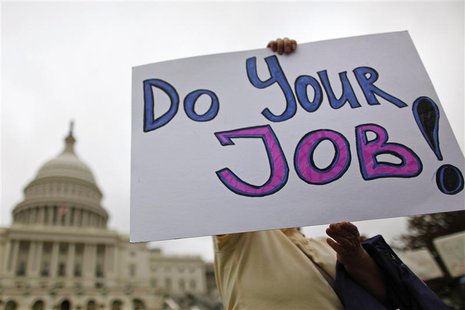 Federal workers demonstrate for an end to the U.S. government shutdown on the west front of the U.S. Capitol in Washington, October 13, 2013 Federal workers demonstrate for an end to the U.S. government shutdown on the west front of the U.S. Capitol in Washington, October 13, 2013