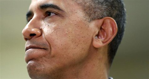 U.S. President Barack Obama speaks to reporters during a visit to Martha's Table, a kitchen which provides meals for the needy, in Washingto U.S. President Barack Obama speaks to reporters during a visit to Martha's Table, a kitchen which provides meals for the needy, in Washingto