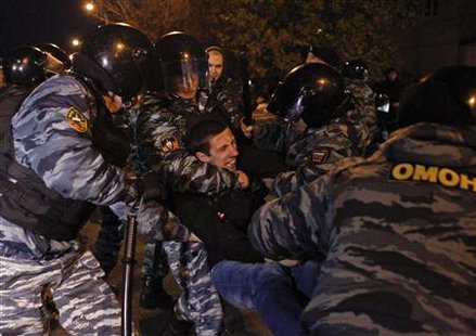 Russian police detain a man after a protest in the Biryulyovo district of Moscow October 13, 2013.
REUTERS/Maxim Shemetov Russian police detain a man after a protest in the Biryulyovo district of Moscow October 13, 2013.
REUTERS/Maxim Shemetov