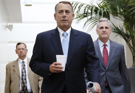 U.S. House Speaker John Boehner (R-OH) (C) and House Majority Whip Rep. Kevin McCarthy (R-CA) (R) arrive for a Republican caucus meeting at U.S. House Speaker John Boehner (R-OH) (C) and House Majority Whip Rep. Kevin McCarthy (R-CA) (R) arrive for a Republican caucus meeting at
