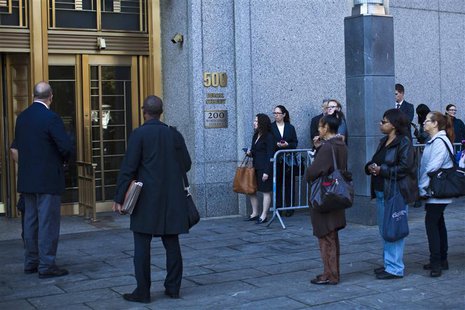 People wait in line to enter Manhattan's federal court where Nazih al-Ragye, known by the alias Abu Anas al-Liby, is expected for arraignmen People wait in line to enter Manhattan's federal court where Nazih al-Ragye, known by the alias Abu Anas al-Liby, is expected for arraignmen