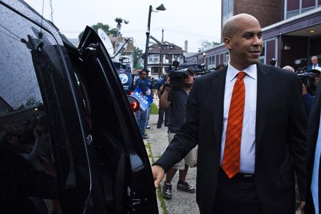 Newark Mayor and U.S. Senate candidate Cory Booker leaves a polling center after casting his ballot during the Senate primary election in Ne Newark Mayor and U.S. Senate candidate Cory Booker leaves a polling center after casting his ballot during the Senate primary election in Ne