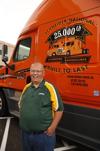 Schneider National's 25,000th Freightliner truck with driver Michael Darras. (Photo by: Schneider National). Schneider National's 25,000th Freightliner truck with driver Michael Darras. (Photo by: Schneider National).