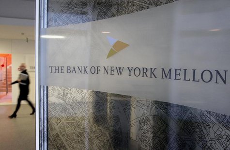 A woman walks past a logo at the office of the Bank of New York Mellon in Brussels, February 25, 2010. REUTERS/Sebastien Pirlet A woman walks past a logo at the office of the Bank of New York Mellon in Brussels, February 25, 2010. REUTERS/Sebastien Pirlet