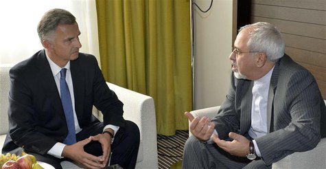 Swiss Foreign Minister Didier Burkhalter (L) talks to Iranian Foreign Minister Mohammad Javad Zarif during a private meeting before the star Swiss Foreign Minister Didier Burkhalter (L) talks to Iranian Foreign Minister Mohammad Javad Zarif during a private meeting before the star