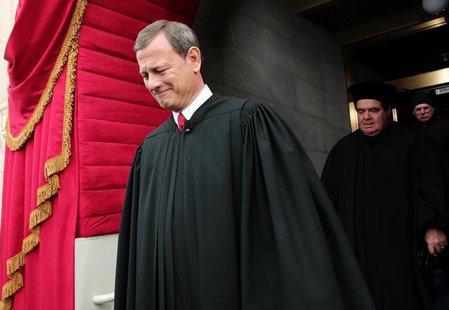 Supreme Court Chief Justice John Roberts is followed by Supreme Court Justice Antonin Scalia as they arrive for the presidential inauguratio Supreme Court Chief Justice John Roberts is followed by Supreme Court Justice Antonin Scalia as they arrive for the presidential inauguratio