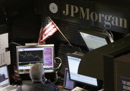 A trader works in the J.P. Morgan stall on floor of the New York Stock Exchange, September 14, 2009. REUTERS/Brendan McDermid A trader works in the J.P. Morgan stall on floor of the New York Stock Exchange, September 14, 2009. REUTERS/Brendan McDermid