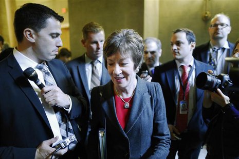U.S. Senator Susan Collins (C) is trailed by reporters as she arrives for a Republican Senate caucus meeting at the U.S. Capitol in Washingt U.S. Senator Susan Collins (C) is trailed by reporters as she arrives for a Republican Senate caucus meeting at the U.S. Capitol in Washingt