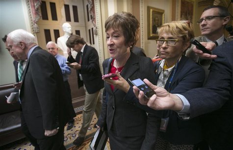 Senator Susan Collins (R-ME) is trailed by reporters as she walks with Senator John McCain (R-AZ) in the U.S. Capitol in Washington October Senator Susan Collins (R-ME) is trailed by reporters as she walks with Senator John McCain (R-AZ) in the U.S. Capitol in Washington October