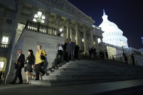 Members of the U.S. House of Representatives depart after a late-night vote on fiscal legislation to end the government shutdown, at the U.S Members of the U.S. House of Representatives depart after a late-night vote on fiscal legislation to end the government shutdown, at the U.S