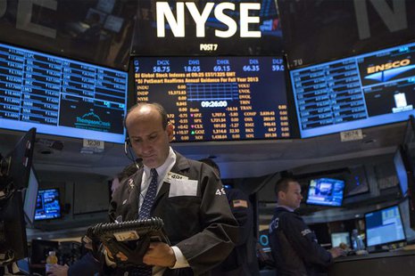 Traders work on the floor of the New York Stock Exchange, October 17, 2013. REUTERS/Brendan McDermid Traders work on the floor of the New York Stock Exchange, October 17, 2013. REUTERS/Brendan McDermid