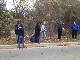 Kalamazoo Public Safety's COPS division worked with the community to clean up area neighborhoods. Kalamazoo Public Safety's COPS division worked with the community to clean up area neighborhoods.