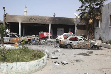 A general view of the scene at the site of clashes between rival militias in Tripoli June 27, 2013. REUTERS/Stringer A general view of the scene at the site of clashes between rival militias in Tripoli June 27, 2013. REUTERS/Stringer