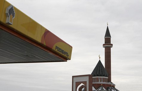 A mosque is seen next to the company logo on a Rosneft petrol station in Moscow December 13, 2012. REUTERS/Maxim Shemetov A mosque is seen next to the company logo on a Rosneft petrol station in Moscow December 13, 2012. REUTERS/Maxim Shemetov