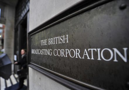 A woman leaves an original entrance to the BBC's New Broadcasting House building in central London December 20, 2012. REUTERS/Toby Melville A woman leaves an original entrance to the BBC's New Broadcasting House building in central London December 20, 2012. REUTERS/Toby Melville