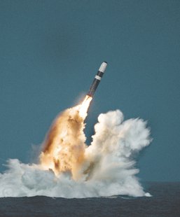 A Sea Launched Trident Missile breaks surface during a test. (Navy.mil image) A Sea Launched Trident Missile breaks surface during a test. (Navy.mil image)