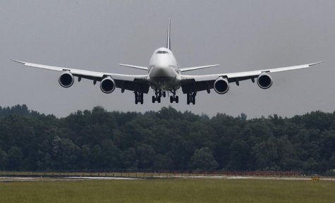 A Lufthansa Boeing 747-8 touches down at Dulles International Airport outside Washington for the first time June 1, 2012. REUTERS/Larry Down A Lufthansa Boeing 747-8 touches down at Dulles International Airport outside Washington for the first time June 1, 2012. REUTERS/Larry Down
