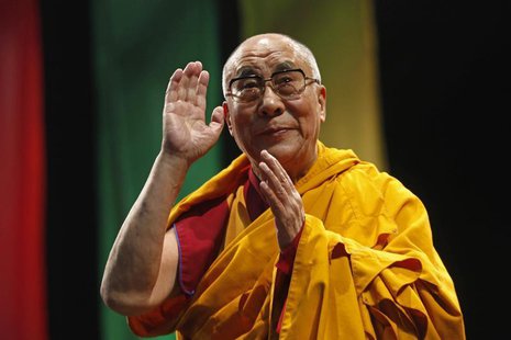 The Dalai Lama greets the audience before his conference "A guide to the way of life of Bodhisattva" in Mexico City, October 12, 2013. REUTE The Dalai Lama greets the audience before his conference "A guide to the way of life of Bodhisattva" in Mexico City, October 12, 2013. REUTE