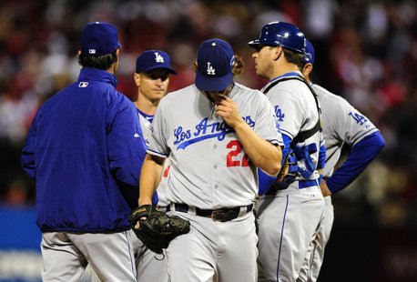 Los Angeles Dodgers starting pitcher Clayton Kershaw (22) walks back to the dugout after being relieved during the fifth inning against the Los Angeles Dodgers starting pitcher Clayton Kershaw (22) walks back to the dugout after being relieved during the fifth inning against the